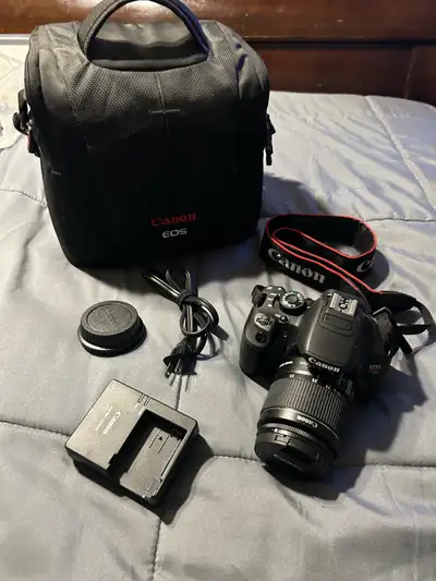 Canon EOS Rebel T4i with Canon EFS 18-55mm Lens w/ Charger, View more