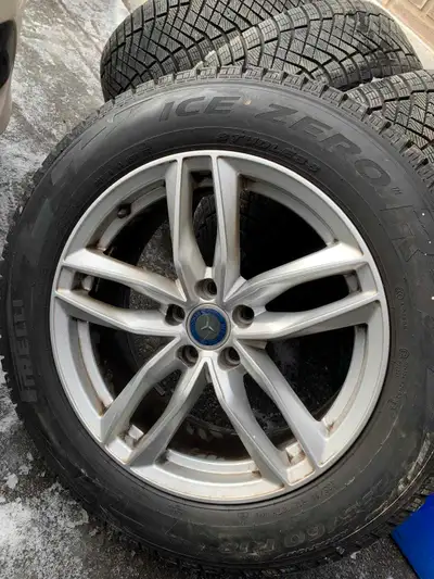 Set of 4 Mercedes Benz with winter tires good condition no curbrashes the tires has lots of treads