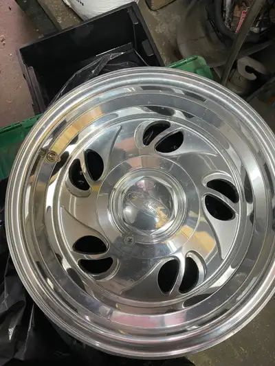 15 x8 chev truck bolt pattern is 5 1/4 and 4 3/4 back space is 3 3/4never seen the road had tires on...