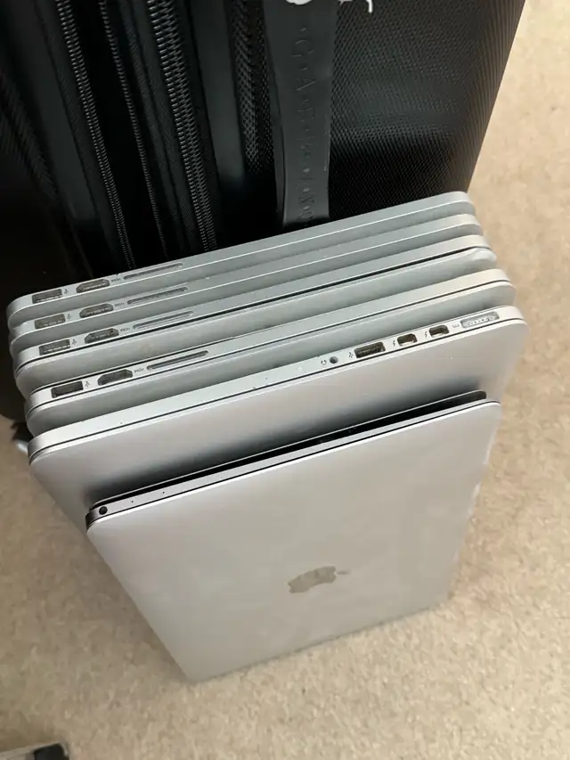 12 top cases with logic boards MacBook Pro models A1502 in Laptops in Edmonton - Image 7