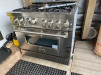 Free 36" luxury all-gas range for salvage or rebuild