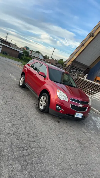 This 2013 Chevrolet Equinox is a well-maintained SUV with low kilometers, offering a reliable and co...