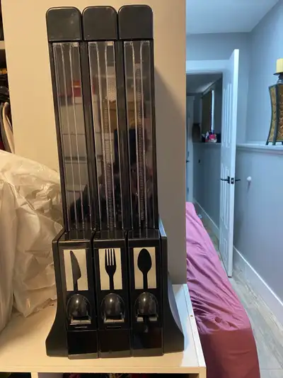 BRAD NEW I have a 3 compartment utensils dispenser it hold forks, knifes, spoons, with 2 box of NEW...