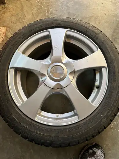 Mini Cooper rims and tires. Four bolt with centre caps and spacers. Probably fits other cars. Was on...