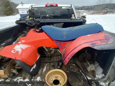 Susuki atv only missing motor and 3 rims