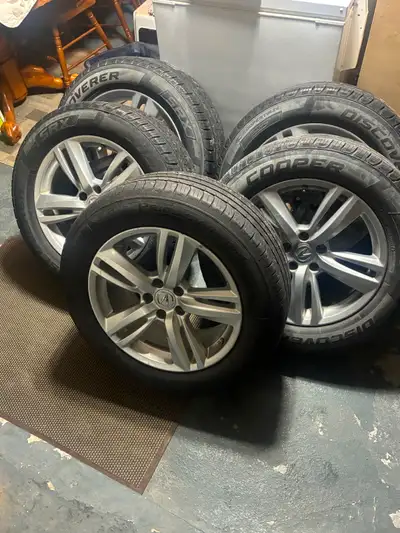 5 Summer Tires and Aluminum Rims to fit Acura RDX. Acura factory rims in excellent condition. Tires...