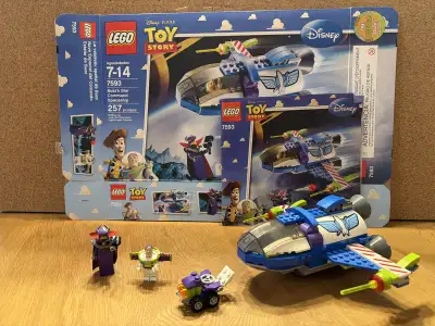Includes box and instructions. Buzz’s canopy missing and Zurg’s red ball missing.
