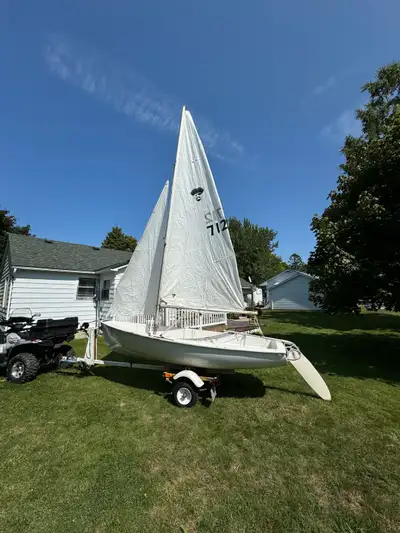 Privateer C-13 in good shape. Fresh interlux paint. New lines. Sails in good shape. New tires lights...