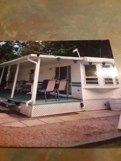 THE TRAILER MUST BE REMOVE FROM CAMPM SITE AND THE DECK IS ALSO FOR SALE