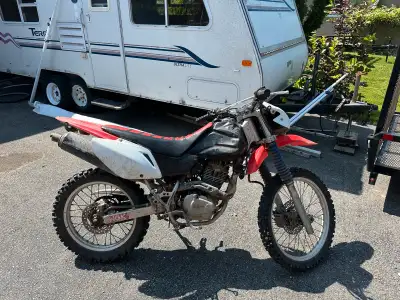 Runs great, shifts great. I have a brake light and turn signals for it aswell. No issues and tires s...