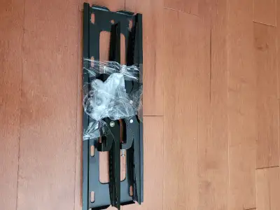 Will mount up to a 40" TV, all hardware included, like new.