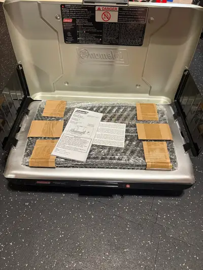 Never used camping grill.