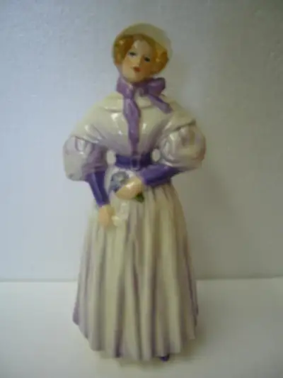 “Gentle Thoughts” is a very beautiful and rare porcelain figurine by Goebel, W Germany. She is a del...