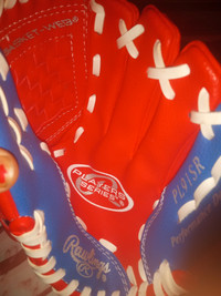 Red n blue Rawlings kids ball glove
