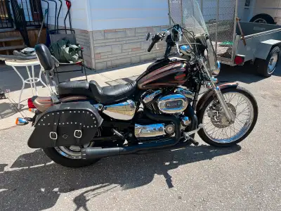 Many extras: 2 into 1 Bassani black headers ,Mustang dual passenger seat,Sissy bar backrest,S&S air...