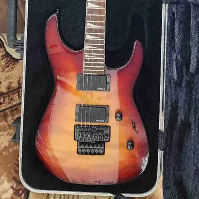 Jackson SLX Soloist, Quilt top sunburst, 2012 Model, Indian rosewood fretboard, EMG HZ pickups, Floy...