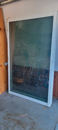 Two patio door inserts/doors/windows