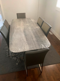 Granite Dining Table with 6 Leather chairs