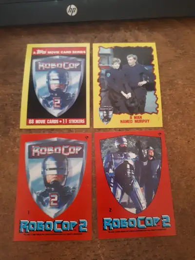 This is a 1990 Topps Robocop 2 complete set with stickers. It is an 88 card base set that includes t...