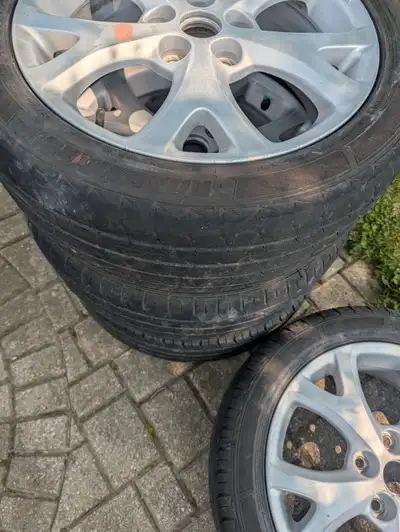 205/50/17 ALLOY RIMS AND TIRES. THESE HAVE BEEN PREP FOR PAINT(90%) WAS GOING TO PUT BACK ON MY MAZD...