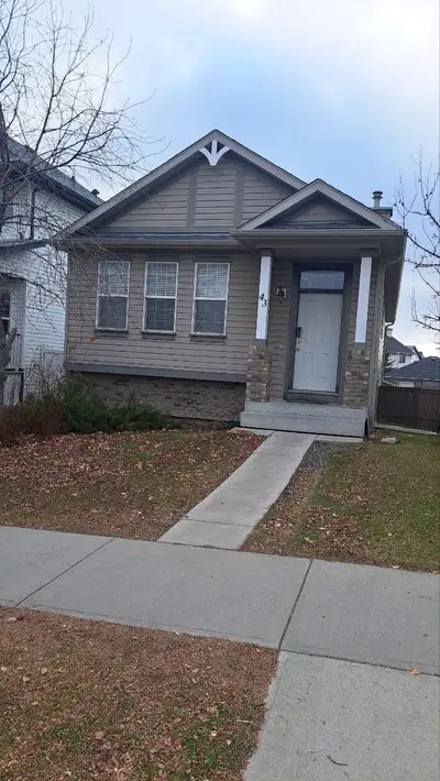 Bright and well-maintained 2-bedroom, 1-bathroom bi-level main floor with a balcony, located on Cove...