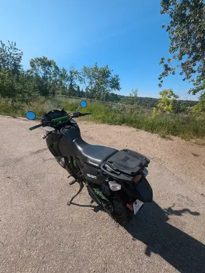 Time to pick up the ultimate adventure bike. This mighty KLR comes with all the upgrades Doohickey T...
