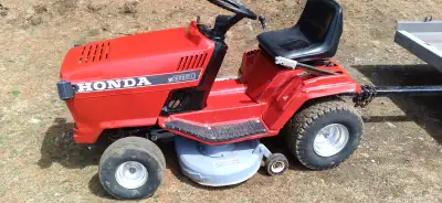 honda tractor 38in cut 10hp runs drives cuts great seat has rip hood and fenders have dents as see i...