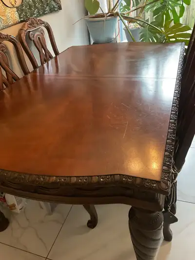 Ashley’s  dinning room table with 6 chairs, hutch., View more