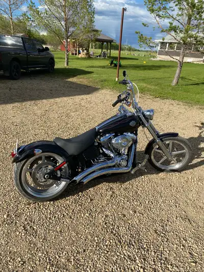 2009 Harley-Davidson Rocker C in very good condition upgraded seat ape hanger bars and has windshiel...