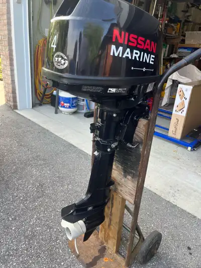 4 hp 4 stroke Nissan/Mercury Outboard. Barely used. Running excellent. Onboard fuel tank and extra f...