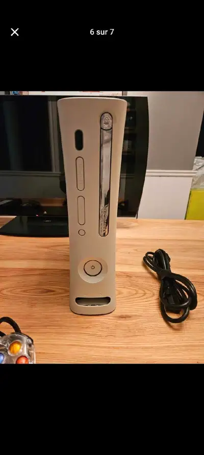 J ai une console xbox360 jailbreak avec jeux et manette et tout accessoire a échanger contre une swi...