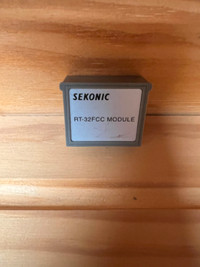 Sekonic wireless flash module.  RT-32FCC model
