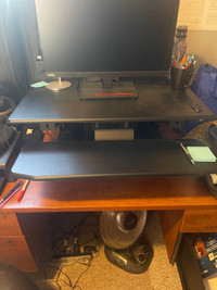 Electric standing desk addition