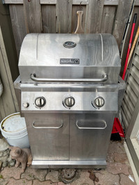 Nexgrill 3-burner Propane BBQ grill with ¾ full propane tank