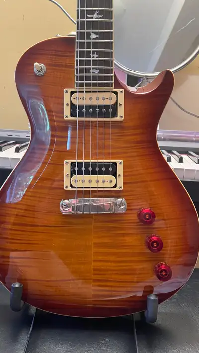 This guitar looks, sounds, feels and plays amazing. Comes with PRS gig bag. In perfect condition- On...