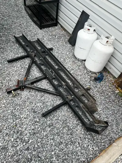 Motor cycle carrier with the ramp that goes into your hitch receiver asking $300 obo