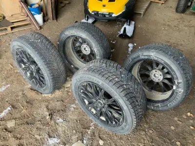 Set of 4 Winter Michelin ice/snow tires and rims for sale. Tire size is 225/55r18. Rims are off a 20...