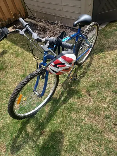 Bicycle for sale, rarely used, come with Helmet, for adults and young kids Tire size 26 inches