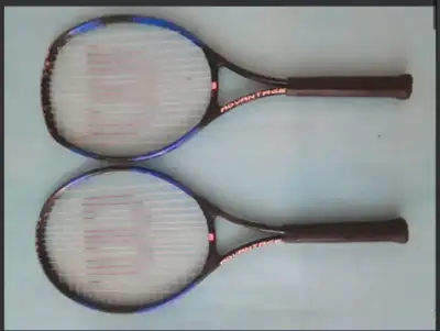 Pair of tennis rackets 27"(raquettes de tennis) for adult, in very good condition.