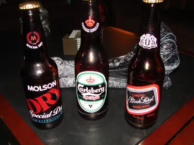 ANTIQUE VINTAGE PAINTED BEER BOTTLES, View more