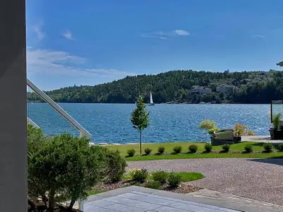 Furnished self contained house. Family room/dining with galley kitchen. Second level large master wi...