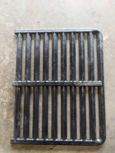 New BBQ grill grates. Porcelain coated cast steel grates for BBQ. They measure 15" x 12". These reta...