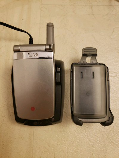 It has a lot of wear and smudges all over. The phone does work, but not sure if you still can use it...