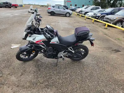 2015 Honda CB500X motorcycle - adventure-style bike with tall windscreen and handguards. Equipped wi...