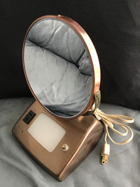 1950s vintage copper magnifying beauty mirror with light. Nice!