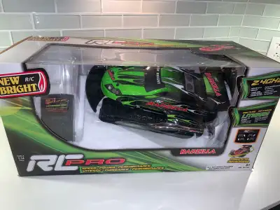 1:14 Scale RC Pro Badzilla Race Car Excellent. All included. Missing battery cover.