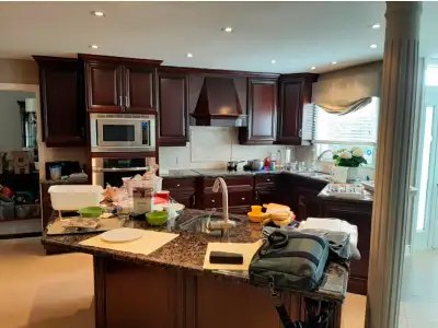 Full kitchen cabinets plus granite counter tops. Island piece included. You must pick up!! $1000 or...