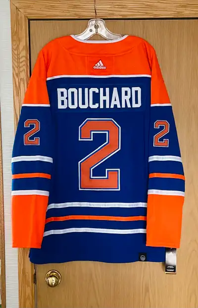 Evan Bouchard Edmonton Oilers Jersey. Home blue orange. Never worn, Brand jersey new with tags, mens...