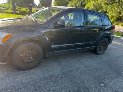 Dodge Caliber for Sale, running condition- will need work for safety This can be used for parts as w...