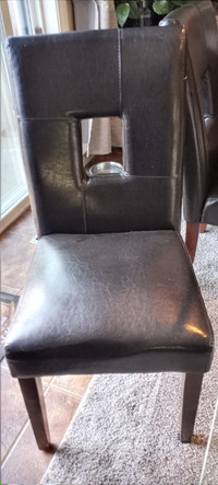 4 blk fax leather dinning chairs $25 each. Moving must sell!